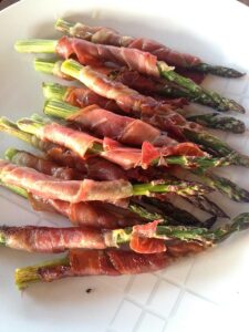 Tips for Enjoying the Holiday Weekend without the Guilt 2 Proscuitto wrapped Asparagus