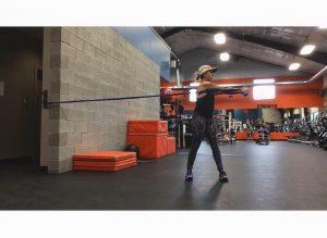 How Not to Plank 6 girl twisting with band