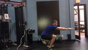 Help Clients Beat a Bad Mood with this 10 Minute Workout 7 squat