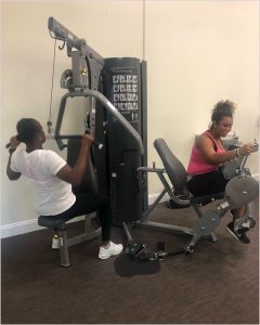 two women working out together