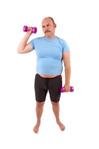Demotivated Sports Man With Dumbbells And A Too Tight Shirt