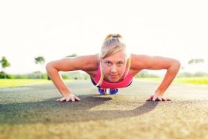 26326684 - athletic woman doing pushup