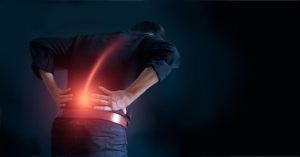 Man Suffering From Back Pain Cause Of Office Syndrome, His Hands