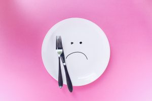 Sad face on a plate